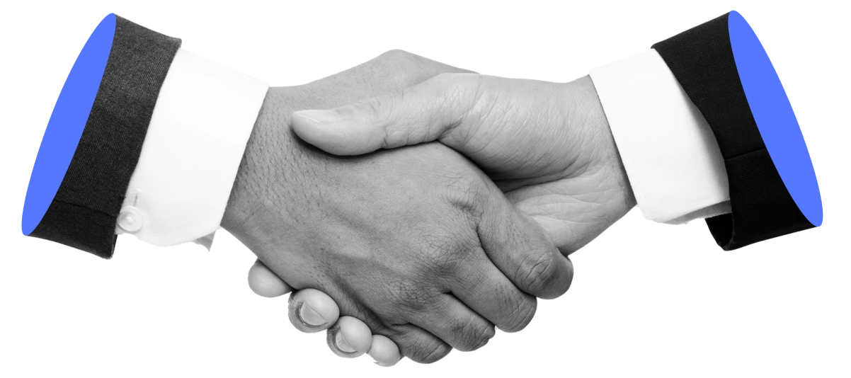Black and white handshake with blue highlights on the sleeves, symbolizing trust and professional collaboration.